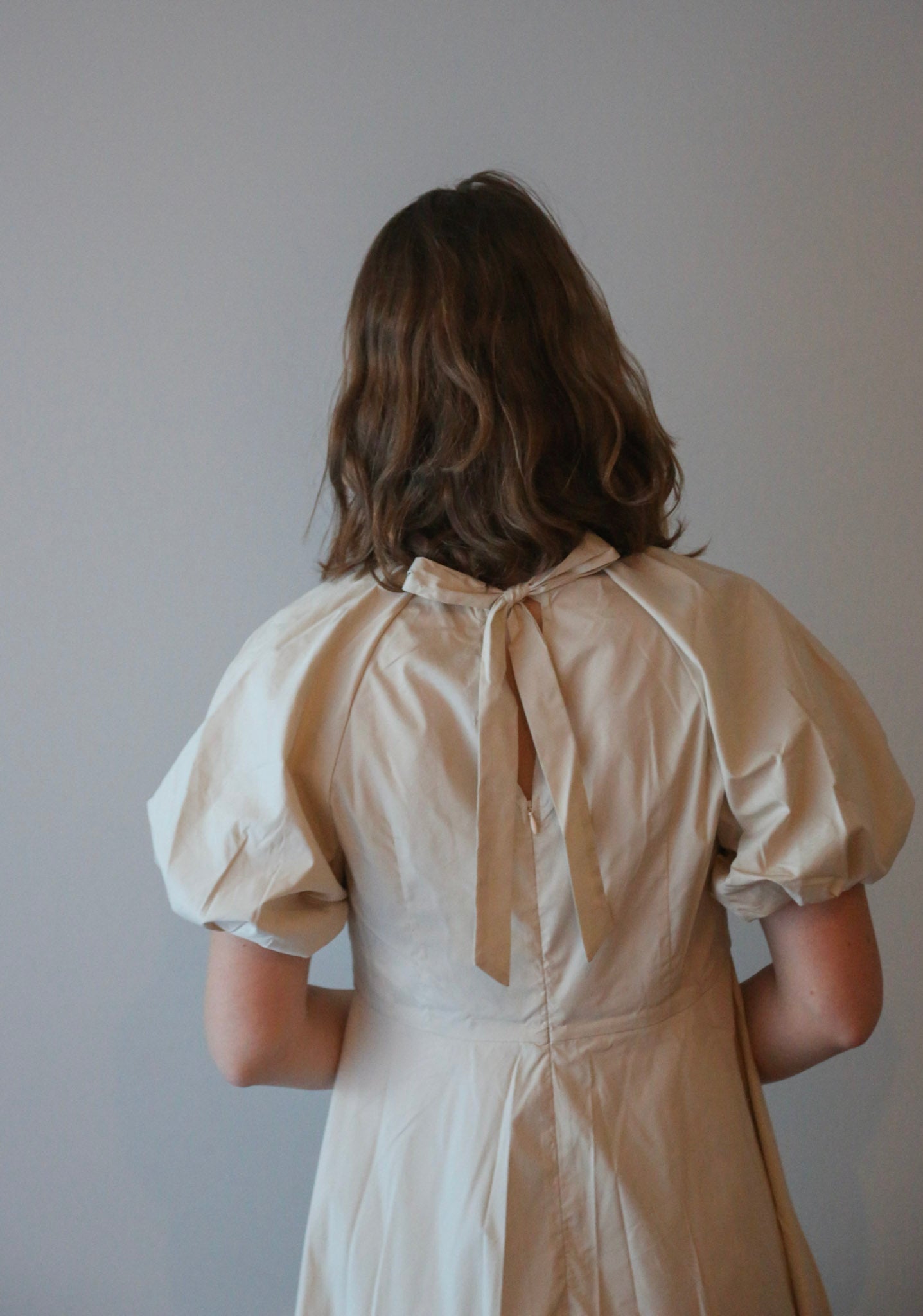 Iris jurk pofmouw beige