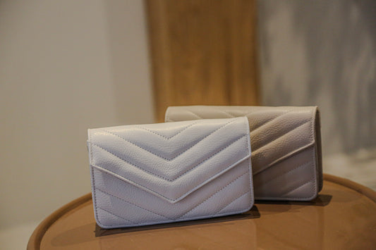 Tas Laurie white