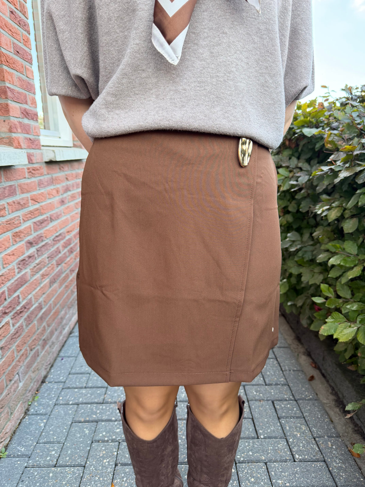 Rok bruin overslag knoop